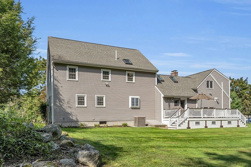 27 Sable Run Lane Methuen, MA 01844 - Photo 42 of 42 a front view of a house with a garden