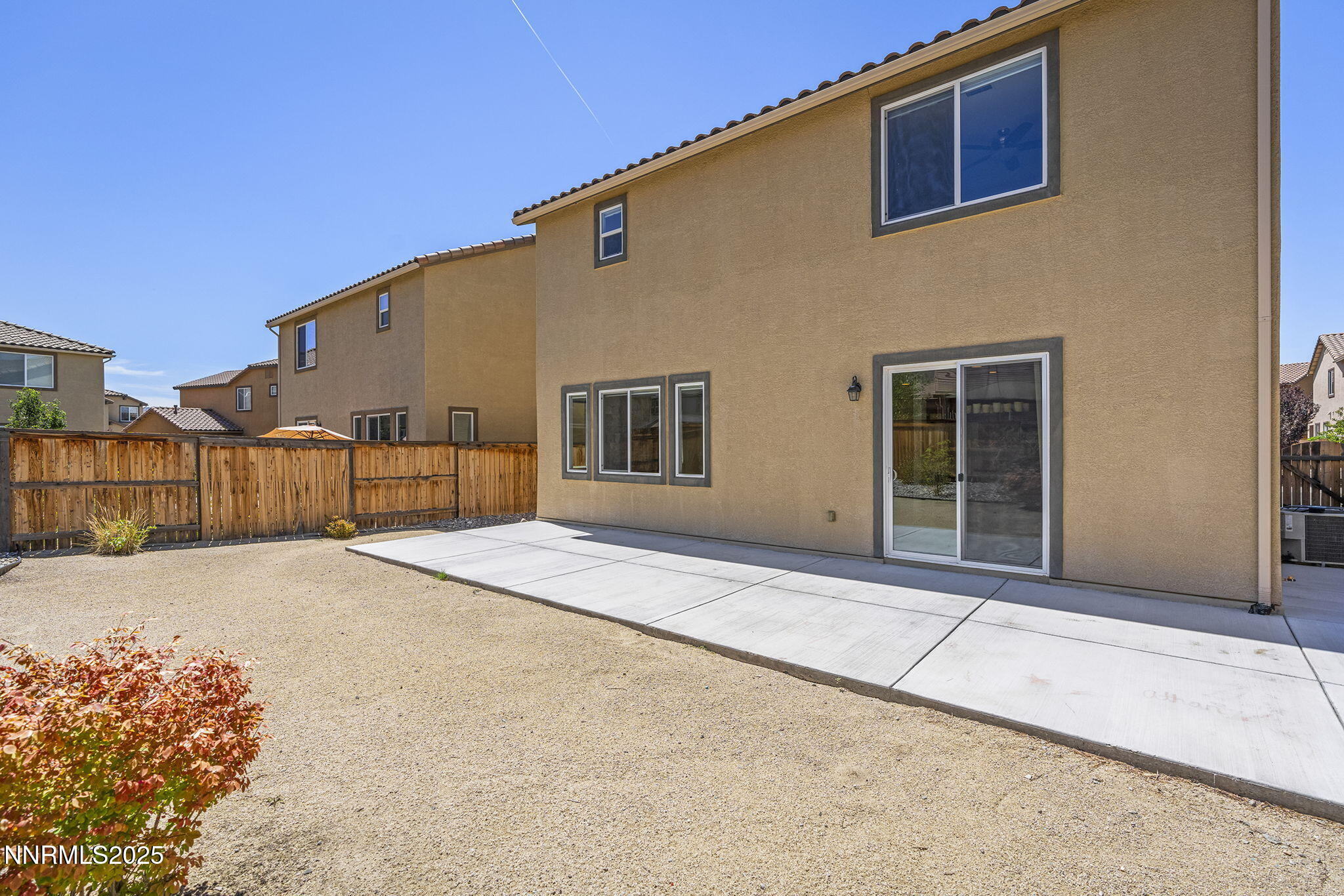 9610 Eventer Lane Reno, NV 89521 - Photo 23 of 38 a house with a outdoor space