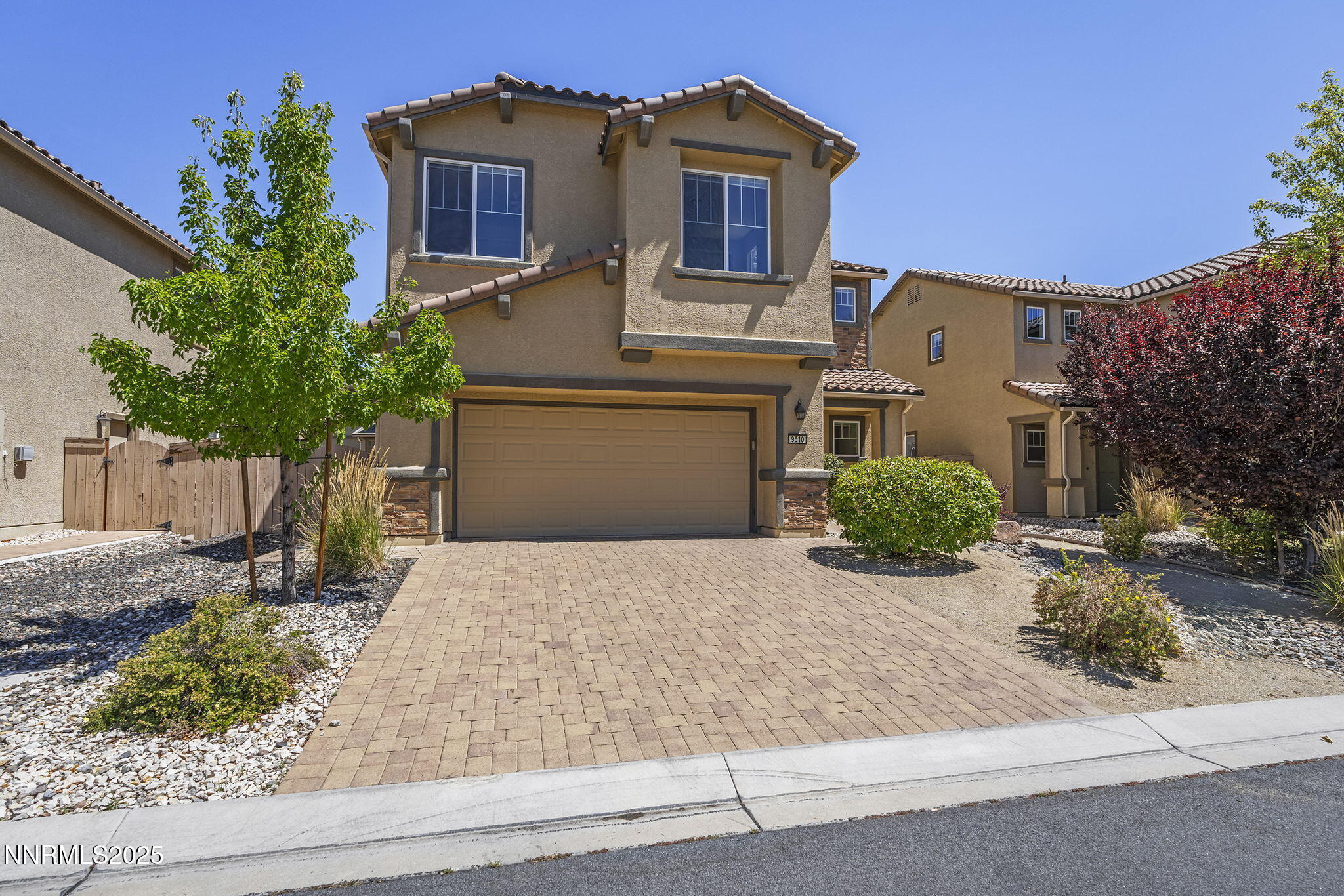 9610 Eventer Lane Reno, NV 89521 - Photo 38 of 38 a front view of a house with garden