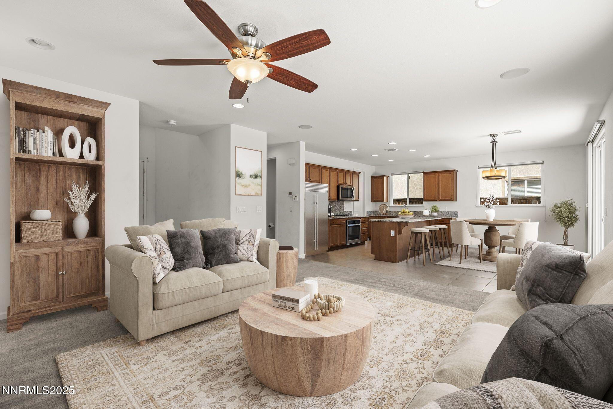 9610 Eventer Lane Reno, NV 89521 - Photo 4 of 38 a living room with furniture and kitchen view