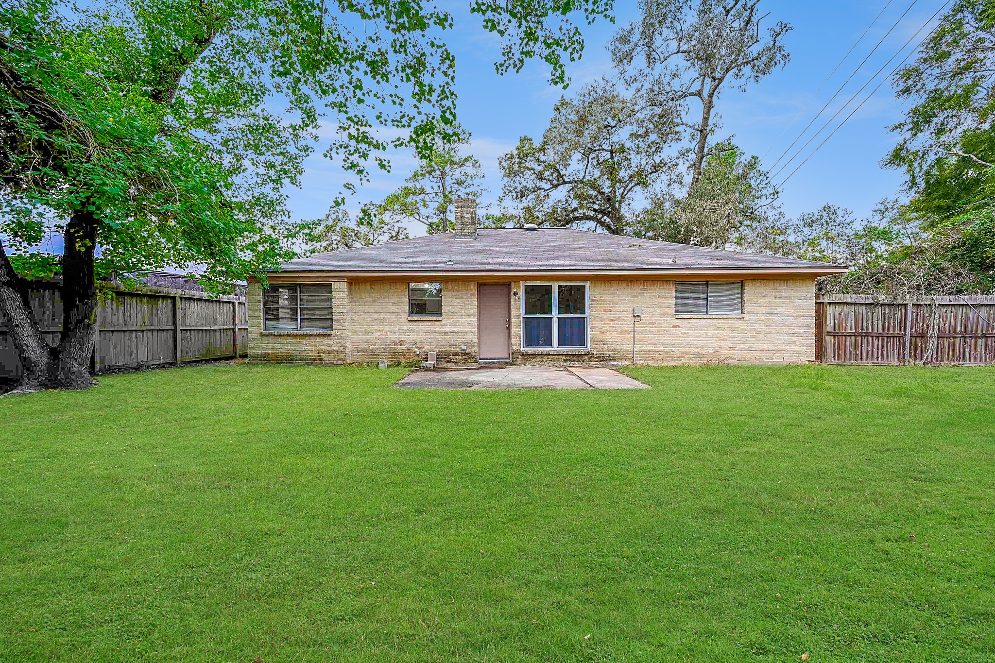 6634 Bridgegate Drive Spring, TX 77373 - Photo 16 of 16 a front view of house with yard and green space