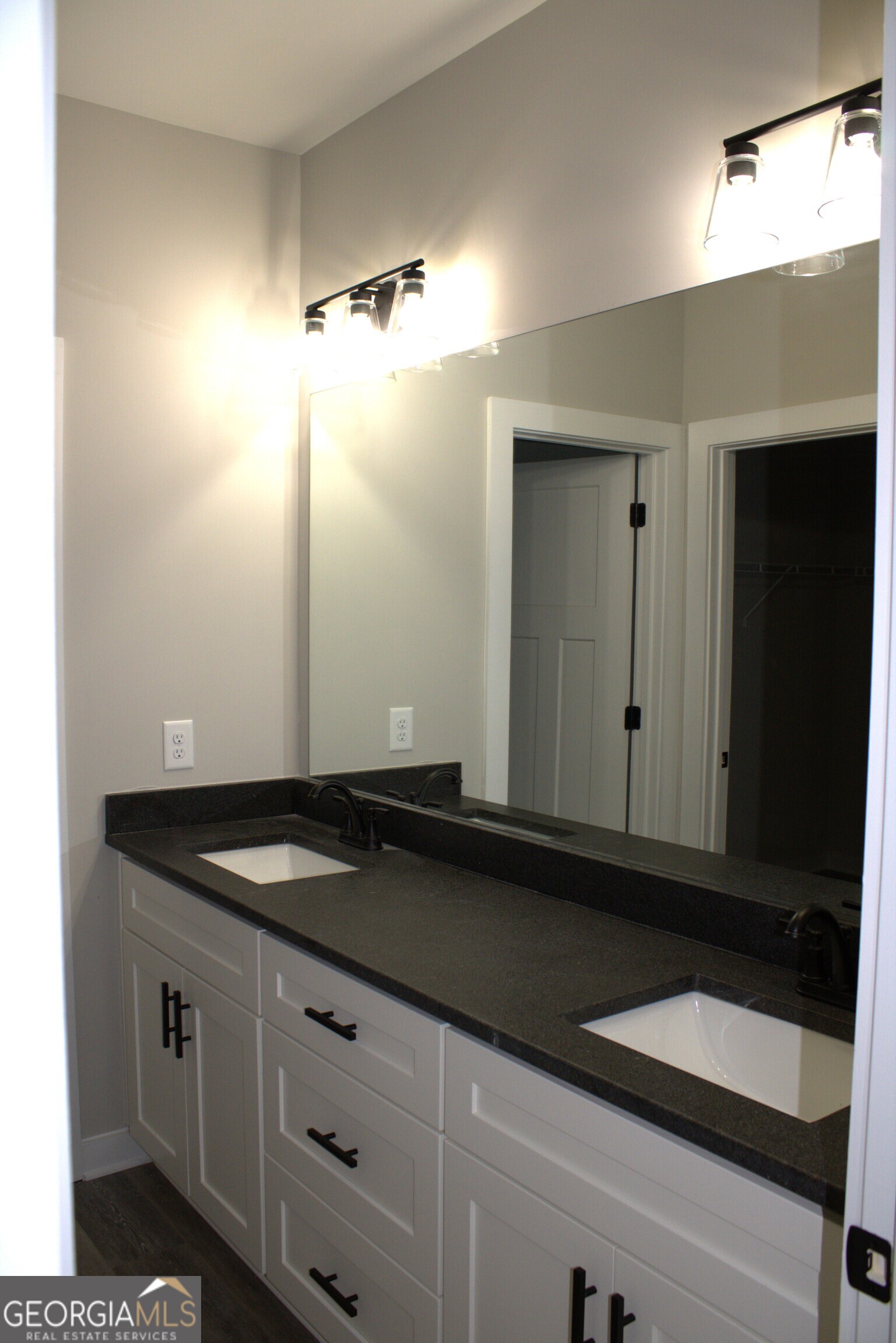 123 Fairview Street Hartwell, GA 30643 - Photo 13 of 23 a bathroom with a sink and a mirror