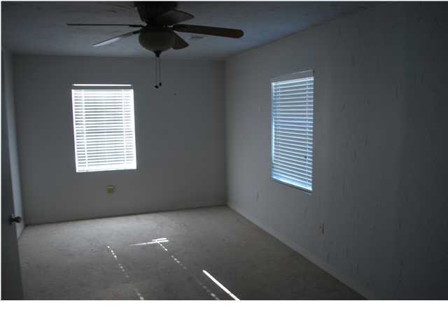 31 Lee Place Santa Rosa Beach, FL 32459 - Photo 4 of 8 a black and white photo of a room