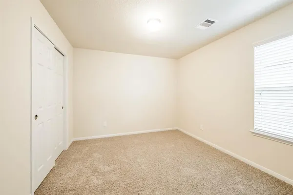 an empty room with a window