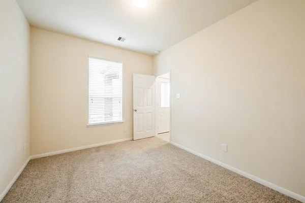 an empty room with a window