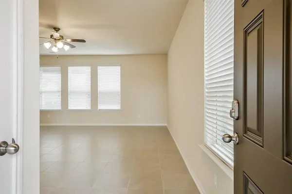 view of an empty room with a window