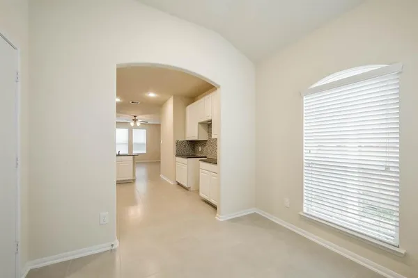 a view of a kitchen and a windows