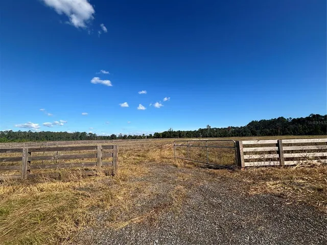 a view of lake with sunset