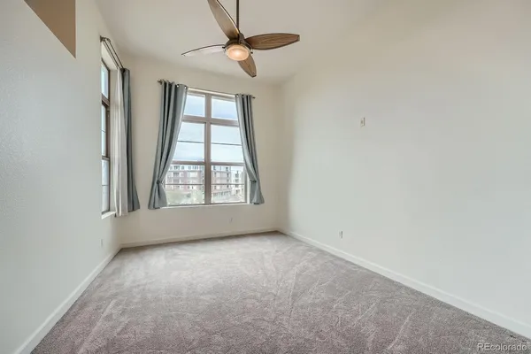 a view of empty room with a window