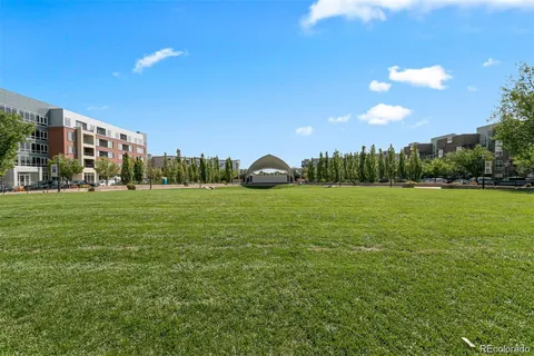 a view of a building with a yard
