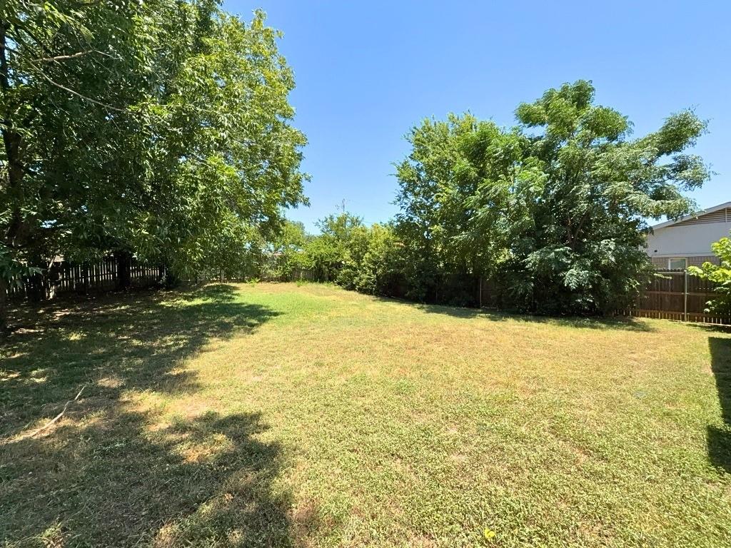 1613 Edgehill Road Benbrook, TX 76126 - Photo 21 of 21 Fenced backyard with mature trees