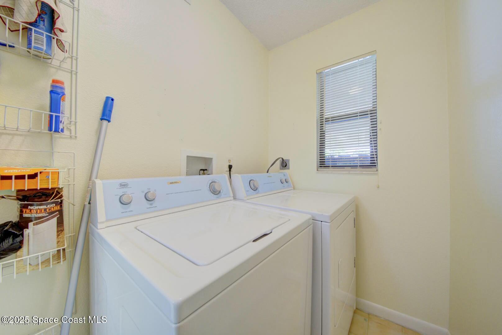227 Augusta Way Melbourne, FL 32940 - Photo 29 of 35 a utility room with dryer and washer