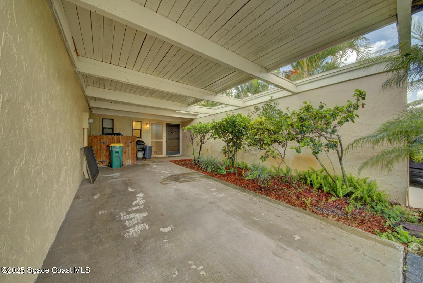 227 Augusta Way Melbourne, FL 32940 - Photo 4 of 35 a view of a porch with furniture