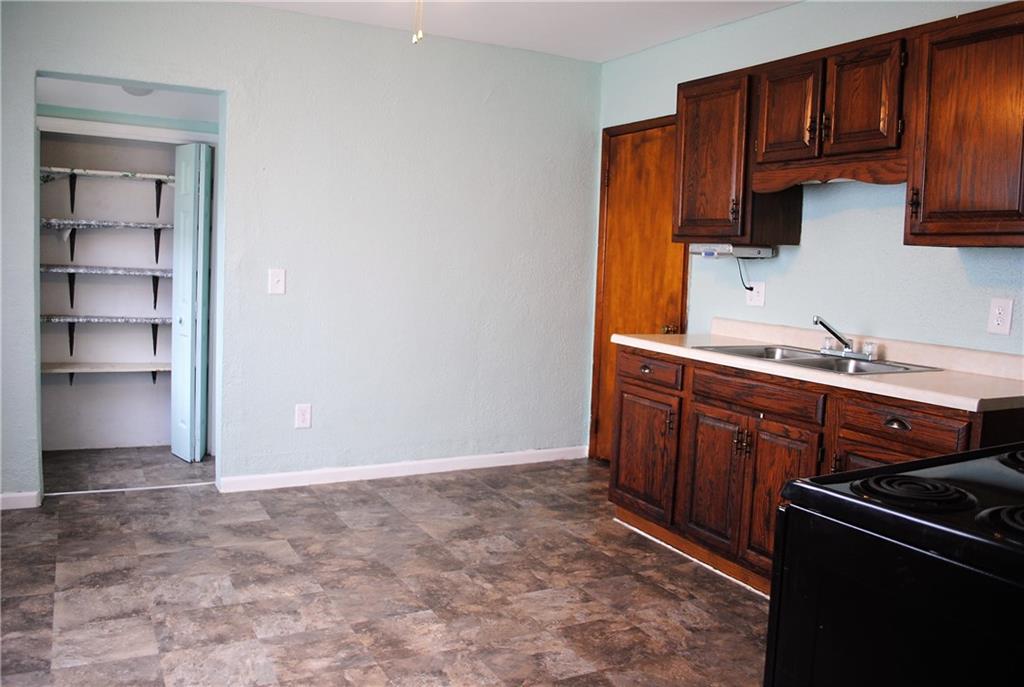 821 Jacoby Road Harwick, PA 15049 - Photo 11 of 22 Spacious eat-in kitchen with pantry closet and plenty of room for more cabinets.
