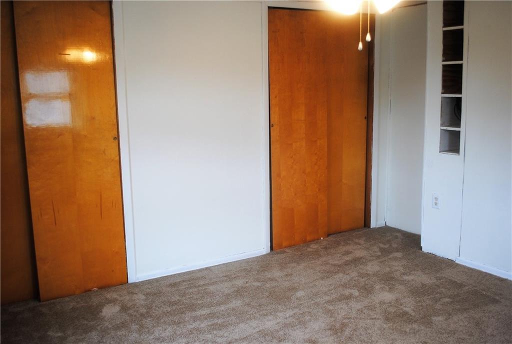 821 Jacoby Road Harwick, PA 15049 - Photo 14 of 22 His and hers closets and extra storage in the master bedroom with brand new carpeting.