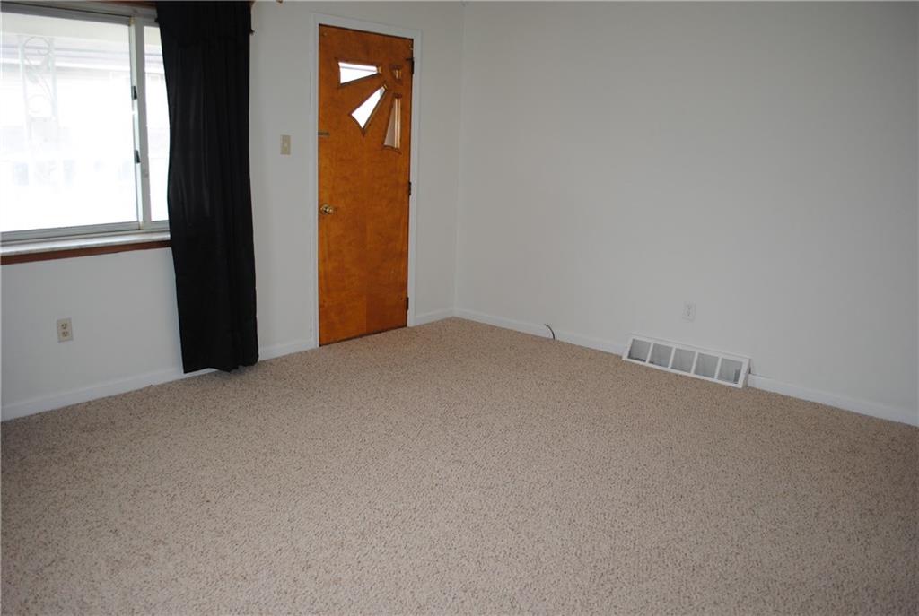 821 Jacoby Road Harwick, PA 15049 - Photo 9 of 22 Large living room with brand new carpeting.