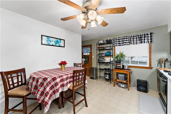 a bedroom with furniture a bed and a chandelier