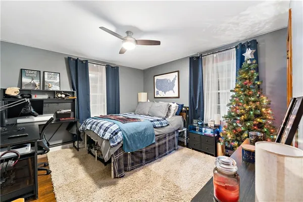 a bed room with a bed and a couch