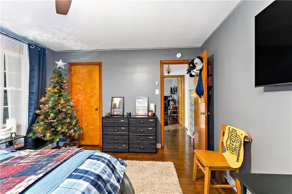 a bedroom with a bed and furniture