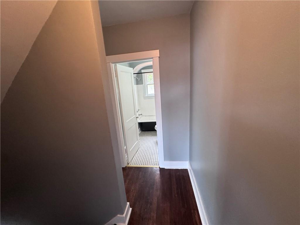 2733 Pyramid Avenue Pittsburgh, PA 15227 - Photo 11 of 14 a view of a hallway with wooden floor
