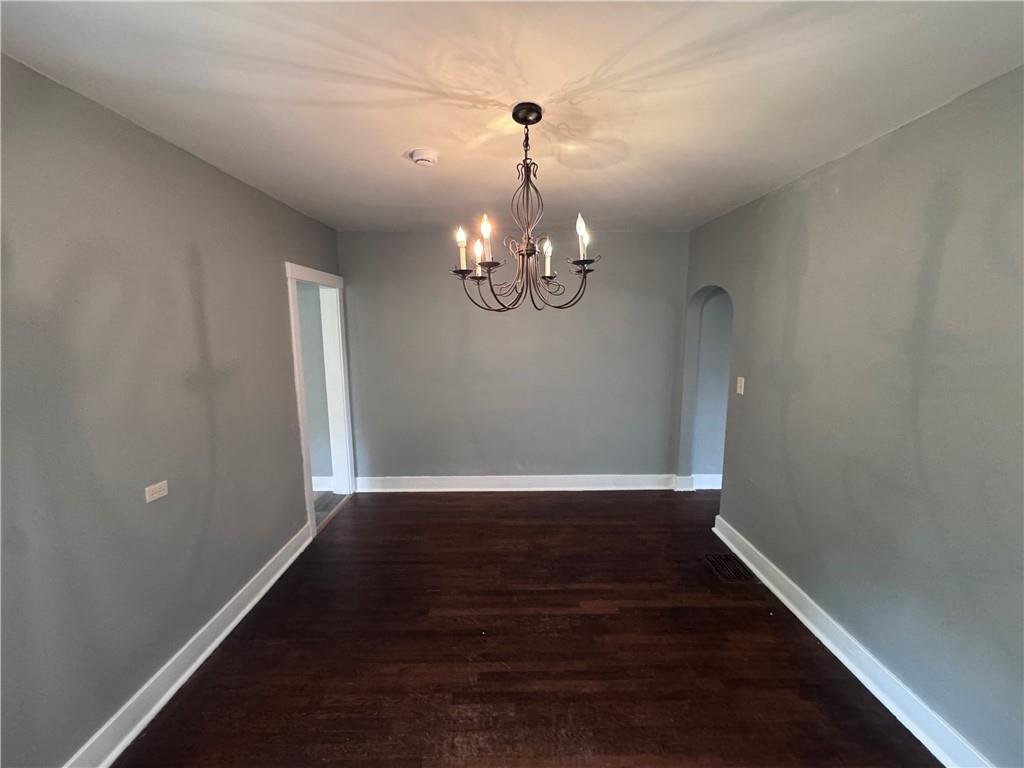 2733 Pyramid Avenue Pittsburgh, PA 15227 - Photo 7 of 14 a view of wooden floor and chandelier in a room