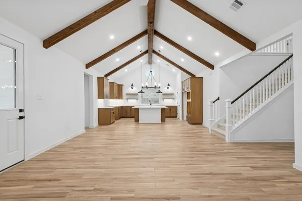 a view of a kitchen with a sink and dishwasher with kitchen view