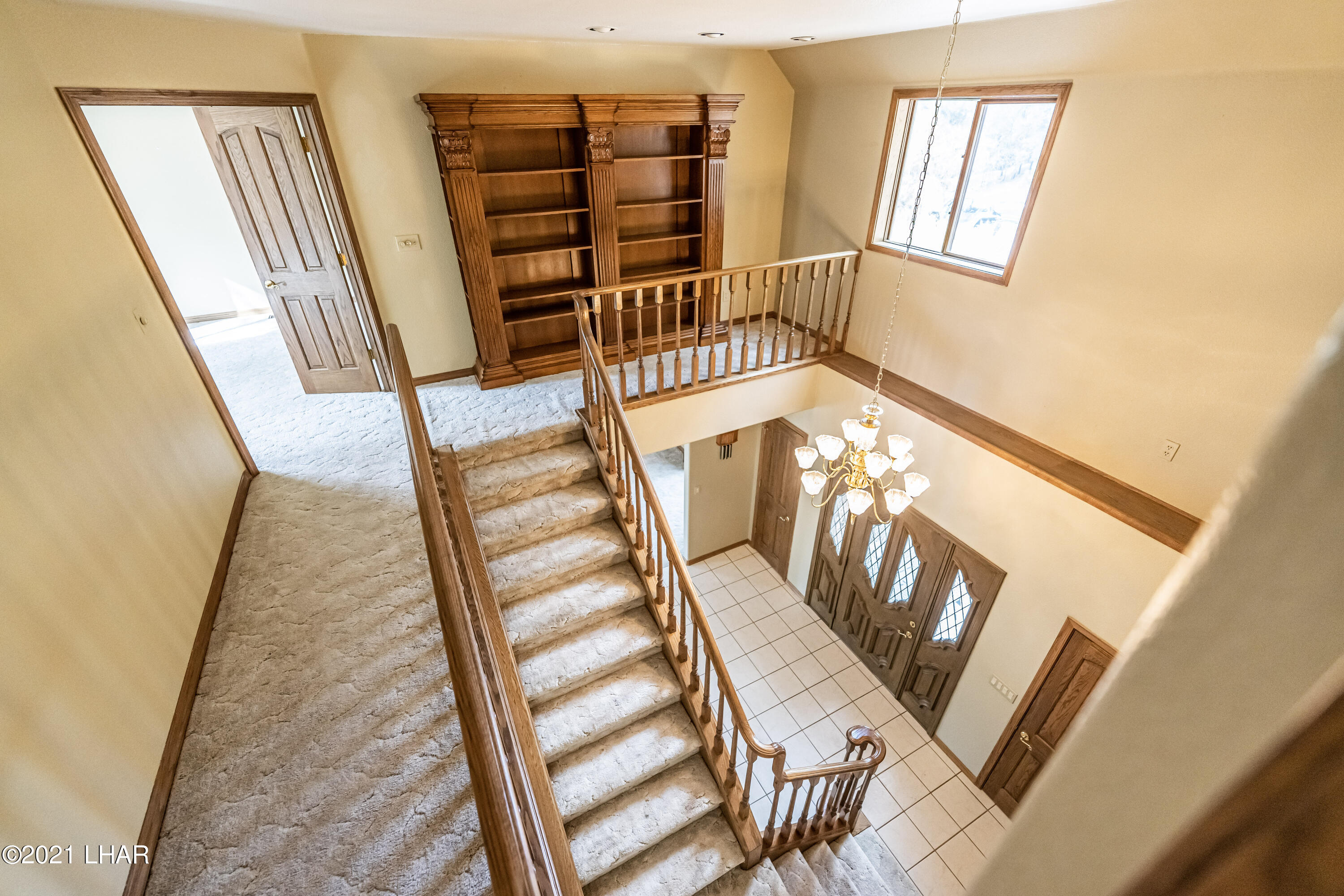 4740 South Ridge Road Kingman, AZ 86401 - Photo 6 of 82 Custom library at the top of landing
