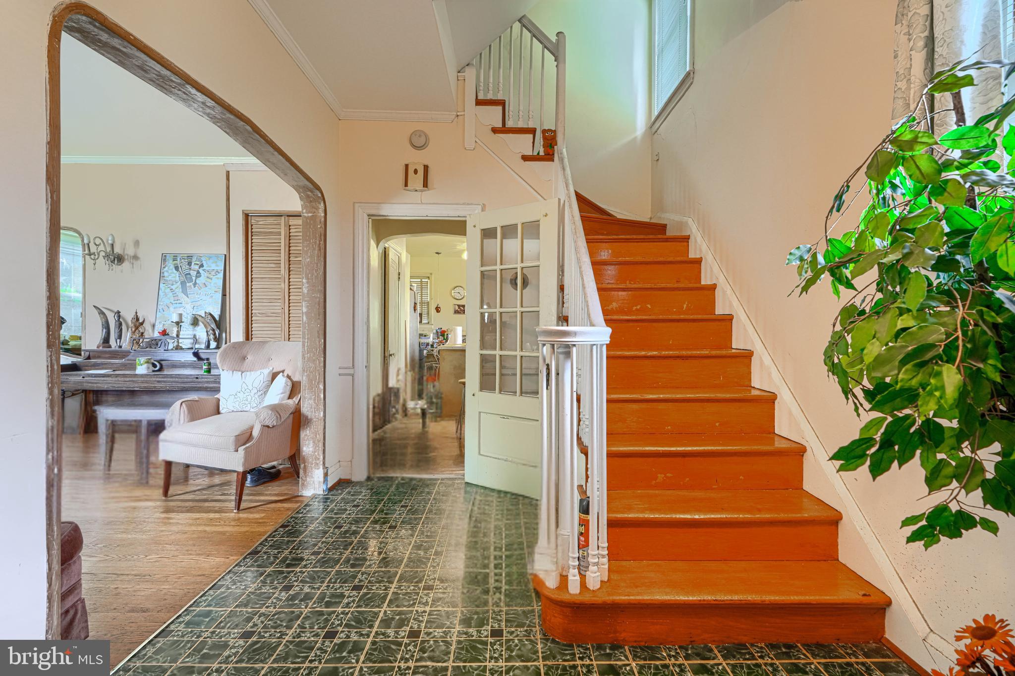 3212 Dorchester Road Baltimore, MD 21215 - Photo 11 of 45 a view of entryway and hall with wooden floor
