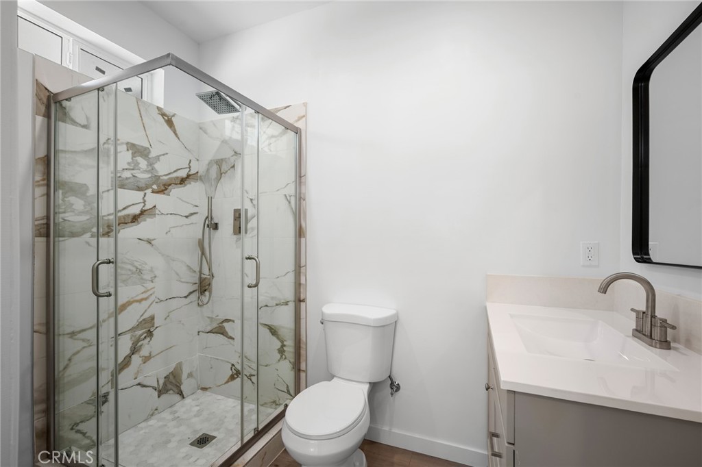 8435 Rincon Avenue Sun Valley, CA 91352 - Photo 33 of 61 a bathroom with a sink toilet and shower