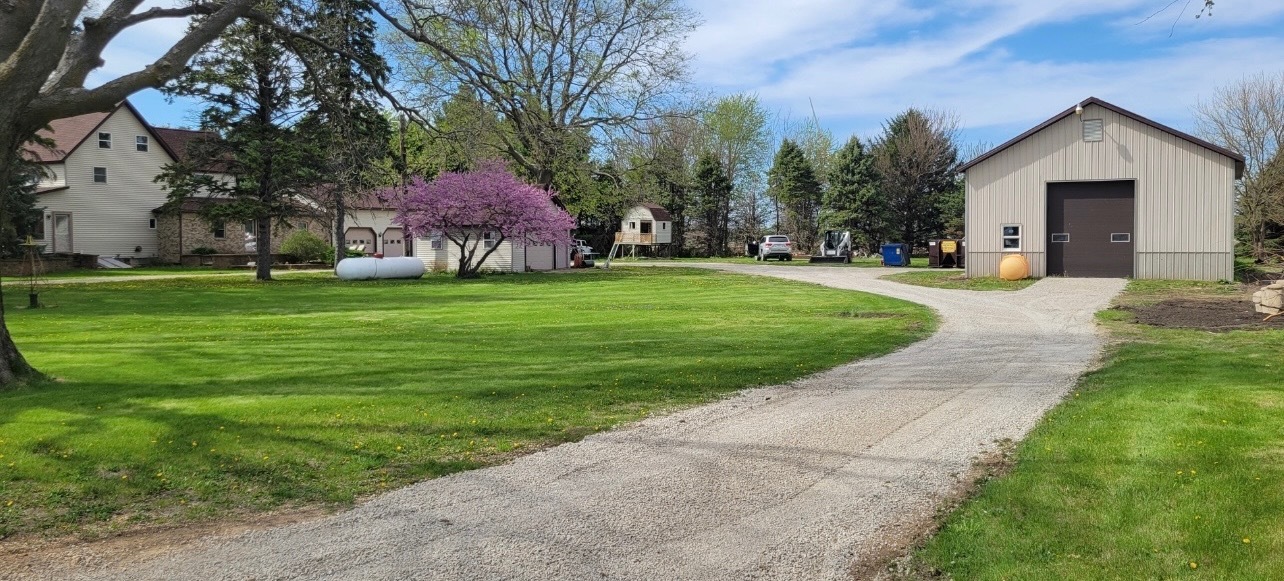 382 Keigwin Road Walnut, IL 61376 - Photo 9 of 49 a front view of a house with garden