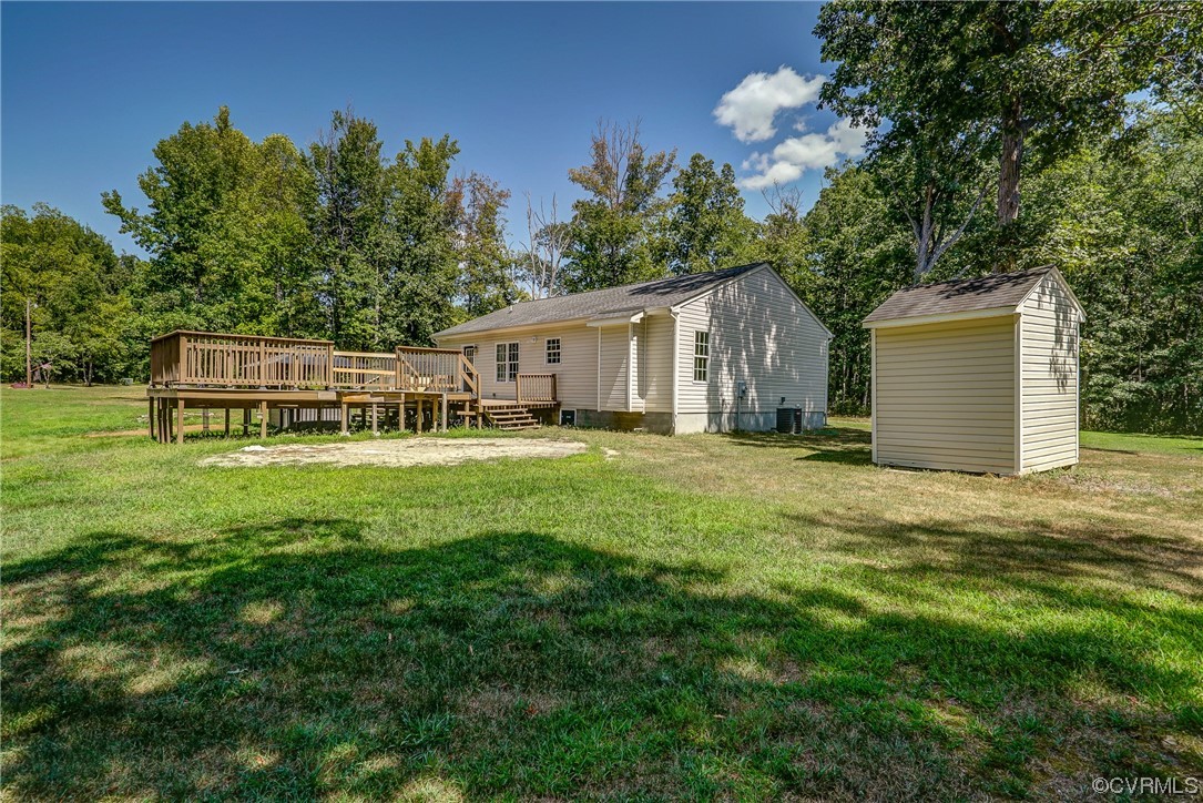 11277 Egypt Road Ashland, VA 23005 - Photo 34 of 46 View of yard featuring a shed and a deck
