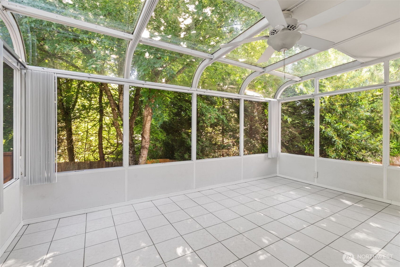 13603 Southeast 239th Street Kent, WA 98042 - Photo 18 of 23 a view of an empty room with a window
