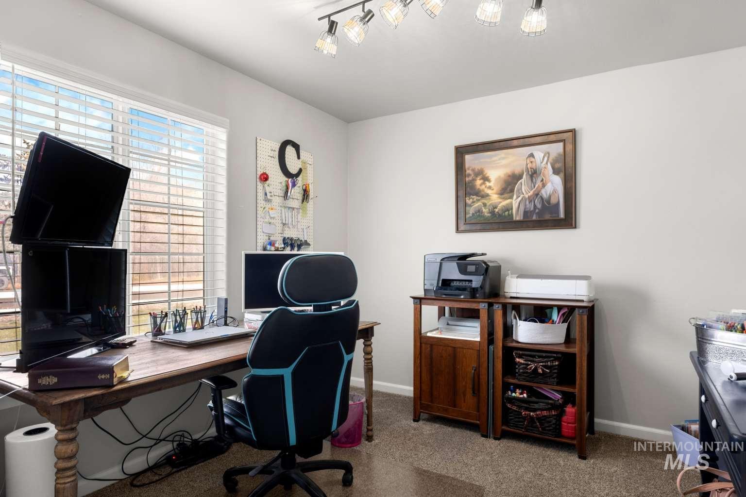 521 East 15th Street Rupert, ID 83350 - Photo 17 of 21 Office featuring light carpet and baseboards