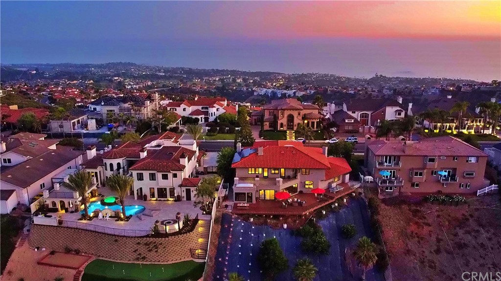 868 Avenida Acapulco San Clemente, CA 92672 - Photo 46 of 52 Aerial view of the backyard. Slope covered with tarp in order to prevent weed growth.