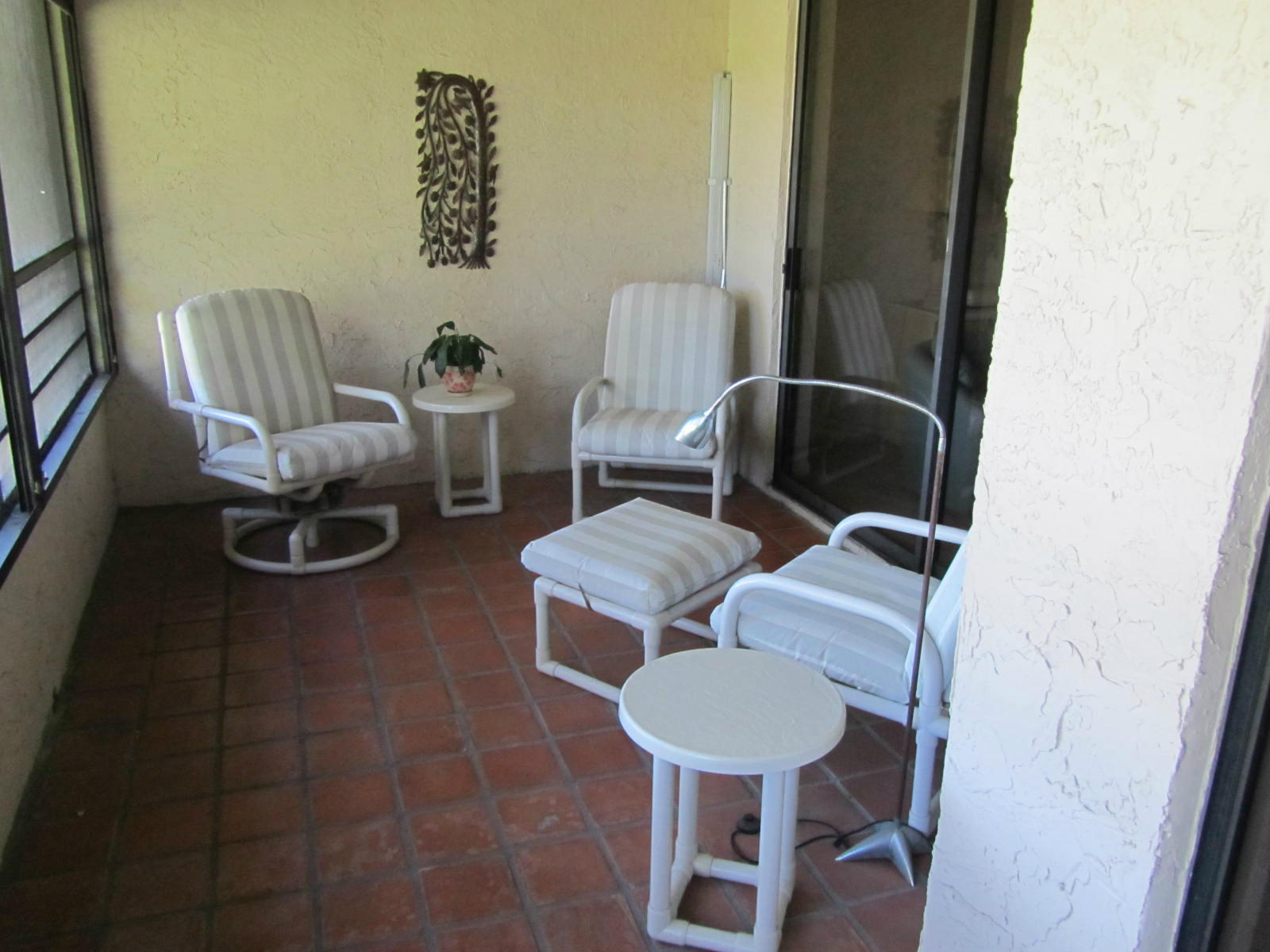 7448 La Paz Boulevard, Unit 203 Boca Raton, FL 33433 - Photo 6 of 7 Screened patio