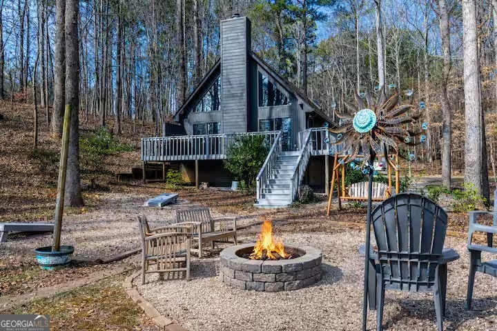 68 Franklin Road Eatonton, GA 31024 - Photo 1 of 28 a view of a house with backyard and sitting area