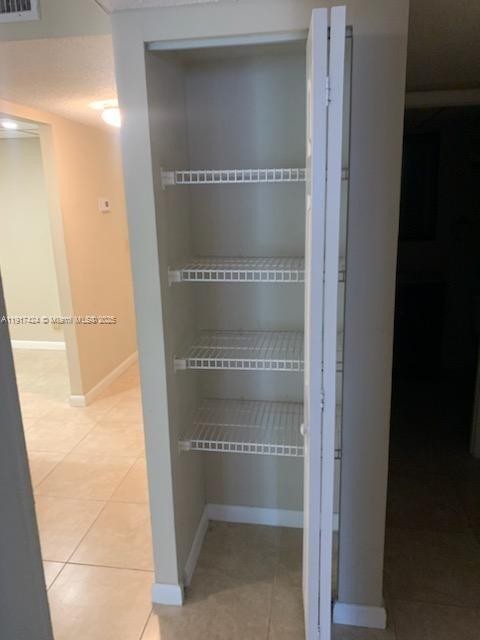 470 Executive Center Drive, Unit 1I West Palm Beach, FL 33401 - Photo 7 of 10 a view of bathroom with shower