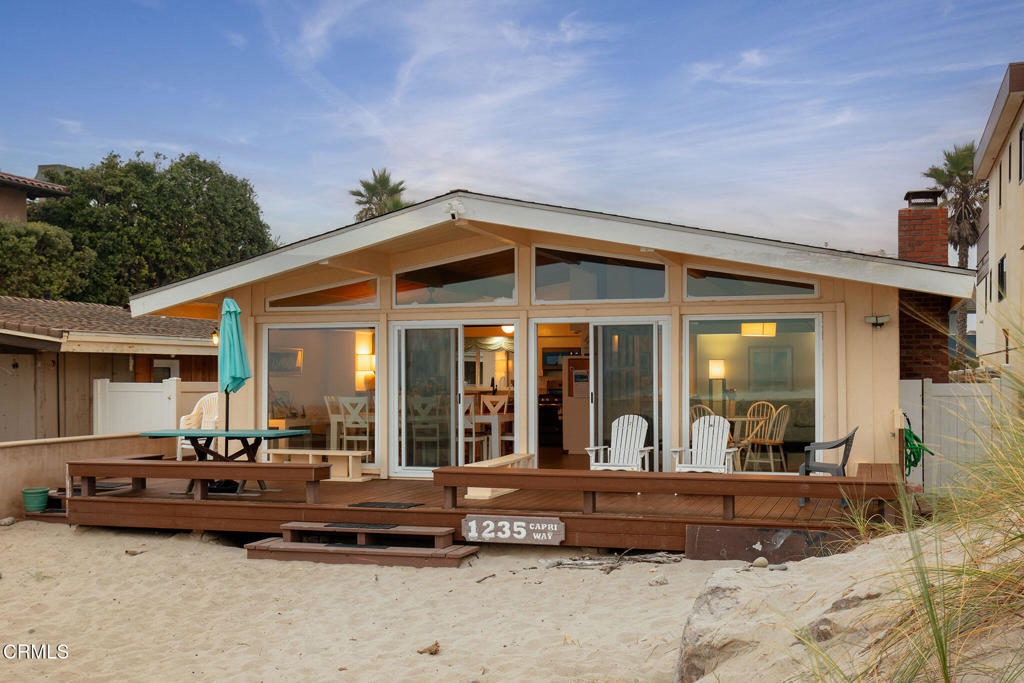 a front view of a house with a outdoor space