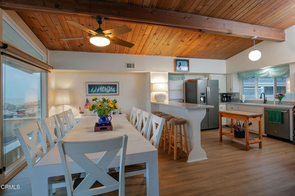 1235 Capri Way Oxnard, CA 93035 - Photo 3 of 21 a view of a dining room with furniture and wooden floor