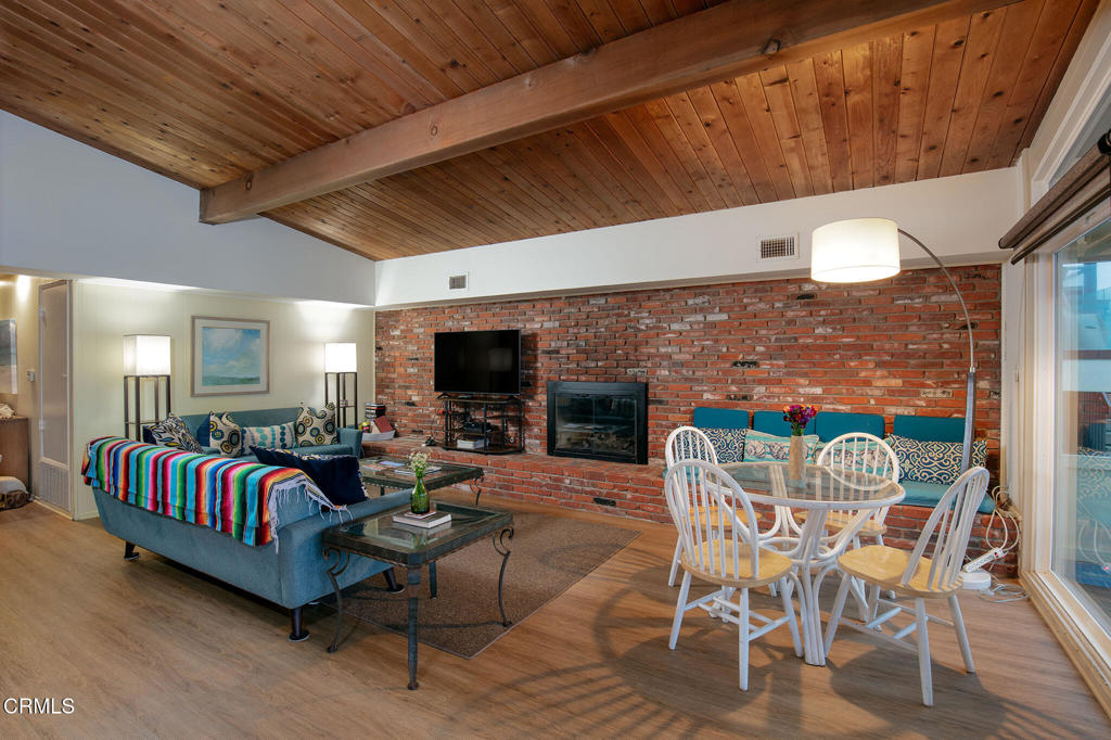 1235 Capri Way Oxnard, CA 93035 - Photo 4 of 21 a outdoor living space with furniture and a flat screen tv