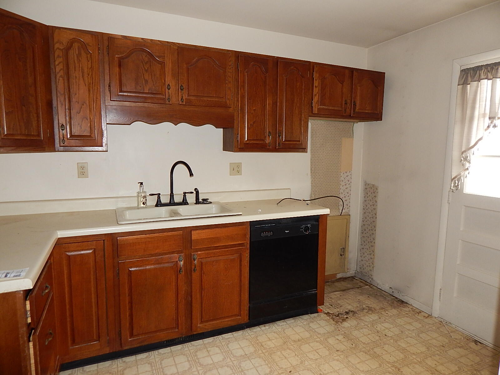 367 Chestnut Street Michigan City, IN 46360 - Photo 5 of 11 a kitchen with sink and cabinets
