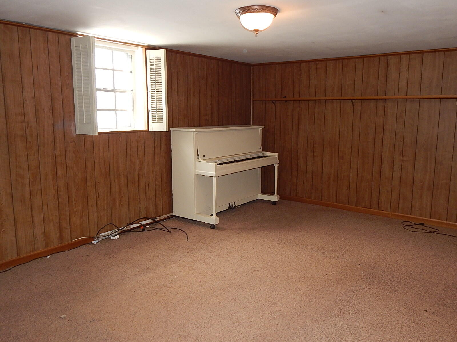 367 Chestnut Street Michigan City, IN 46360 - Photo 8 of 11 an empty room with windows and ceiling fan