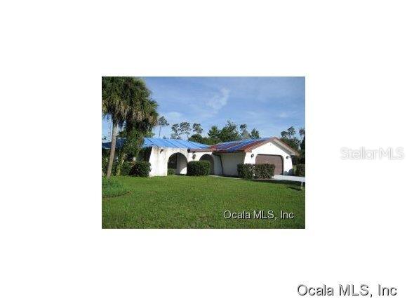 14112 Southwest 34th Terrace Road Ocala, FL 34473 - Photo 1 of 1 a black and white photo of a house