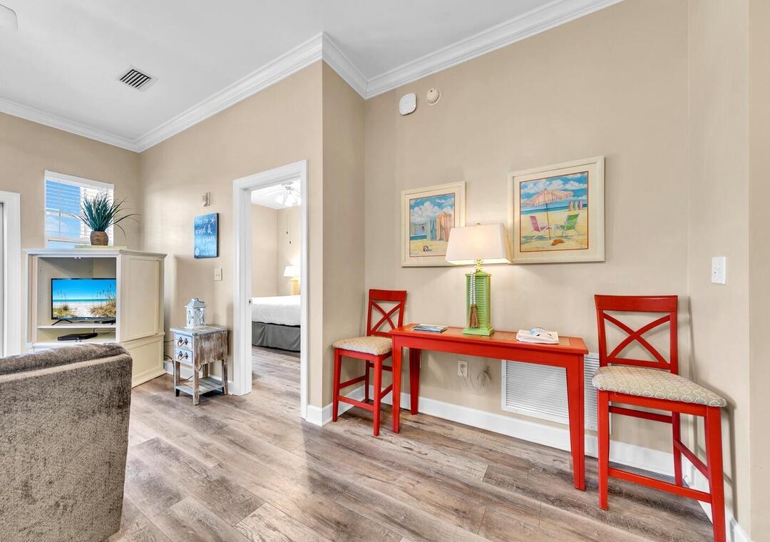 231 Somerset Bridge Road, Unit 2308 Santa Rosa Beach, FL 32459 - Photo 16 of 47 a view of a living room filled with furniture and wooden floor