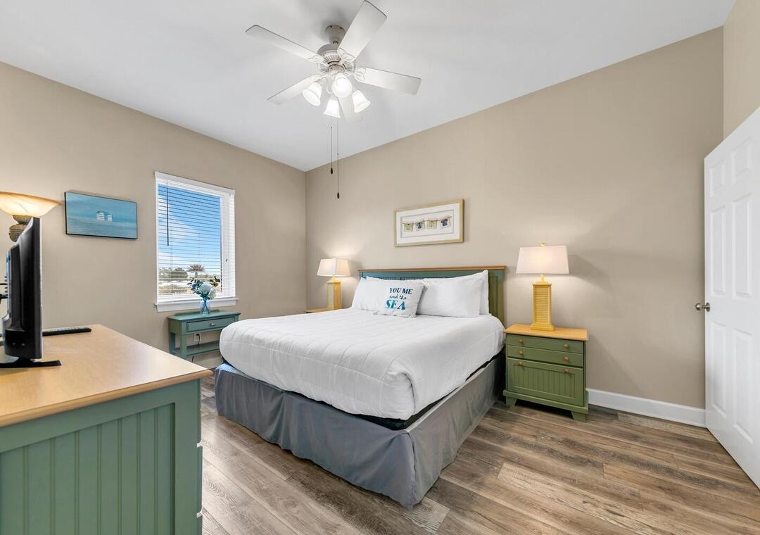 231 Somerset Bridge Road, Unit 2308 Santa Rosa Beach, FL 32459 - Photo 18 of 47 a bedroom with a bed and a flat screen tv
