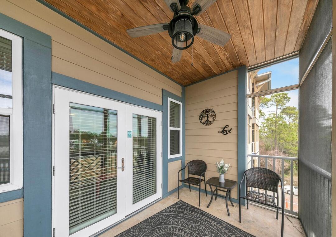 231 Somerset Bridge Road, Unit 2308 Santa Rosa Beach, FL 32459 - Photo 2 of 47 a view of a door and chair in the balcony