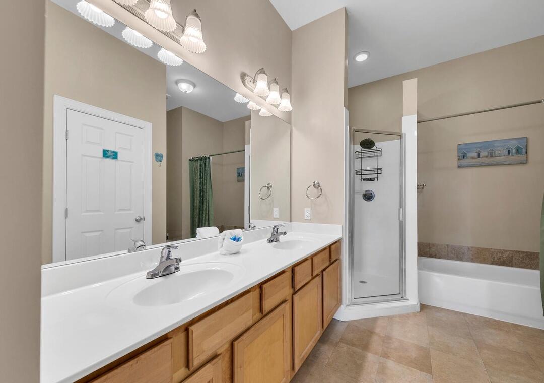 231 Somerset Bridge Road, Unit 2308 Santa Rosa Beach, FL 32459 - Photo 21 of 47 a bathroom with a double vanity sink mirror and shower