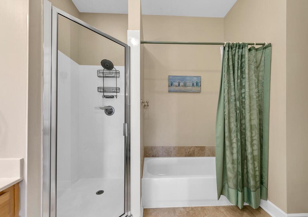 231 Somerset Bridge Road, Unit 2308 Santa Rosa Beach, FL 32459 - Photo 22 of 47 a bathroom with a bathtub and a shower