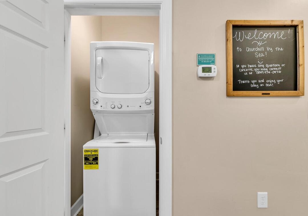 231 Somerset Bridge Road, Unit 2308 Santa Rosa Beach, FL 32459 - Photo 30 of 47 a utility room with dryer and washer