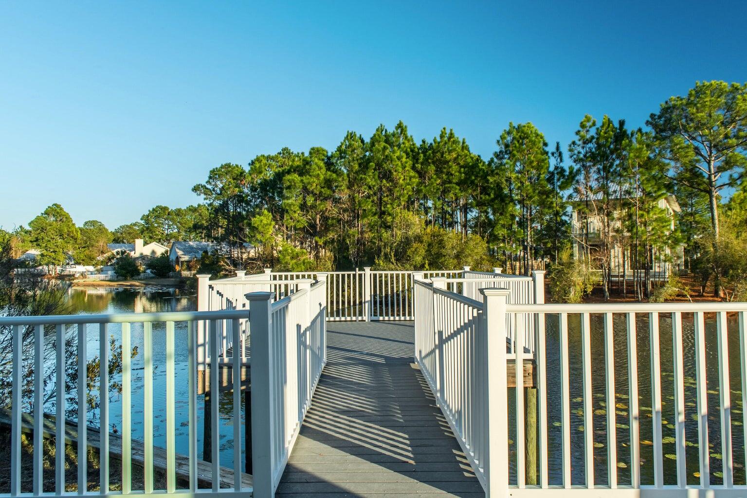 231 Somerset Bridge Road, Unit 2308 Santa Rosa Beach, FL 32459 - Photo 45 of 47 a balcony with trees in front of it